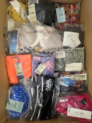 The photo shows a package with clothing in the category ABW.
