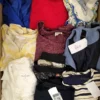 The photo shows a package with clothing in the category U.