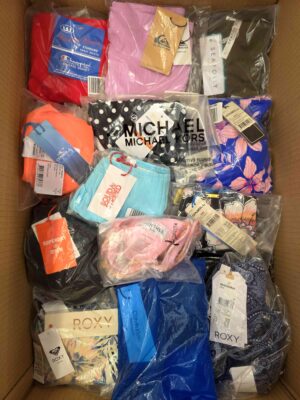 The photo shows a package with clothing in the category ABW.