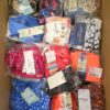 The photo shows a package with clothing in the category ABW.