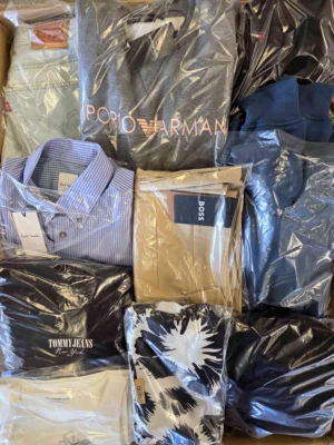 The photo shows a package with clothing in the category C.