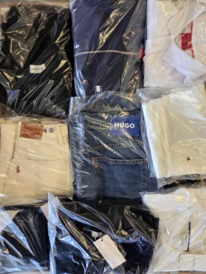 The photo shows a package with clothing in the category C.