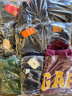 The photo shows a package with clothing in the category C.