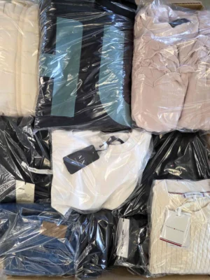 The photo shows a package with clothing in the category C.