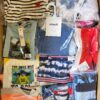 The photo shows a package with clothing in the category N.