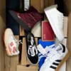The photo shows a package with footwear in the category BS.