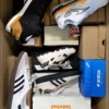 The photo shows a package with footwear in the category BS.