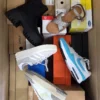 The photo shows a package with footwear in the category BS.
