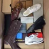 The photo shows a package with footwear in the category BS.