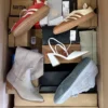 The photo shows a package with footwear in the category BS.