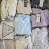 GB353 2 The photo shows a package with clothing in the category B.