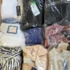 GB359 1 The photo shows a package with clothing in the category B.