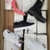 The photo shows a package with footwear in the category BS.