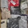 The photo shows a package with clothing in the category AW.