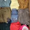 TSC415 2 The photo shows a package with clothing in the category TSC.