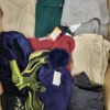The photo shows a package with clothing in the category TSC.