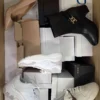 The photo shows a package with footwear in the category BS.