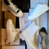 The photo shows a package with footwear in the category BS.