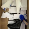 The photo shows a package with footwear in the category BS.