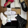 The photo shows a package with footwear in the category BS.