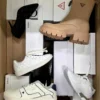 The photo shows a package with footwear in the category BS.