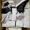 The photo shows a package with footwear in the category BS.