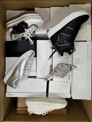 The photo shows a package with footwear in the category BS.