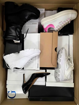The photo shows a package with footwear in the category BS.