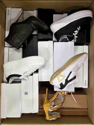 The photo shows a package with footwear in the category BS.