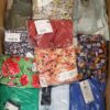 The photo shows a package with clothing in the category AR.