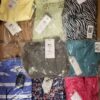 The photo shows a package with clothing in the category AR.