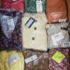 The photo shows a package with clothing in the category AR.