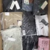 The photo shows a package with clothing in the category AM.