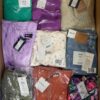 The photo shows a package with clothing in the category AR.