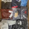 The photo shows a package with clothing in the category AM.