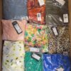 The photo shows a package with clothing in the category AR.