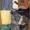 The photo shows a package with clothing in the category AM.