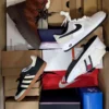 The photo shows a package with footwear in the category CS.