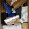 The photo shows a package with footwear in the category CS.
