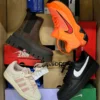 The photo shows a package with footwear in the category CS.