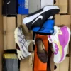 The photo shows a package with footwear in the category CS.