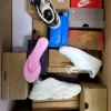 The photo shows a package with footwear in the category CS.