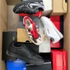 The photo shows a package with footwear in the category CS.