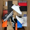 The photo shows a package with footwear in the category CS.