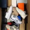 The photo shows a package with footwear in the category CS.
