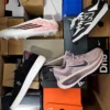 The photo shows a package with footwear in the category CS.