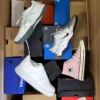 The photo shows a package with footwear in the category CS.