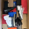 The photo shows a package with footwear in the category CS.