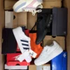 The photo shows a package with footwear in the category CS.