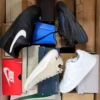 The photo shows a package with footwear in the category CS.